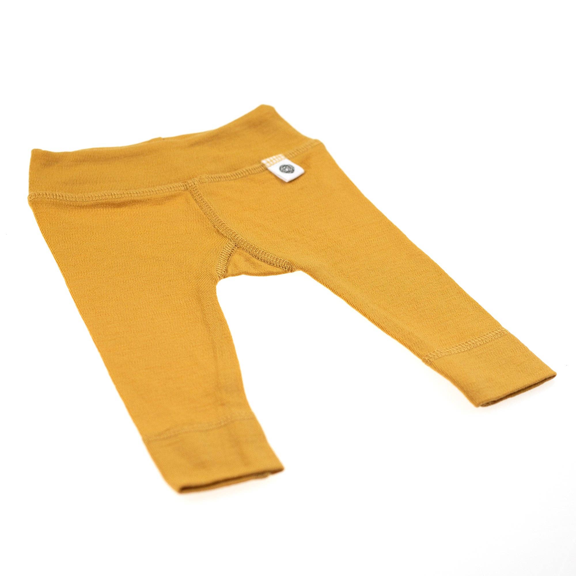 Legging bébé en laine mérinos non traitée, vêtement naturel et respirant pour garder bébé au chaud sans surchauffe couleur jaune