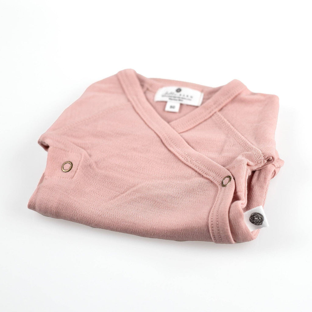 Body bébé en laine mérinos non traitée, manches longues, matière naturelle thermorégulante, idéal comme première couche, présenté plié Couleur : Misty Rose