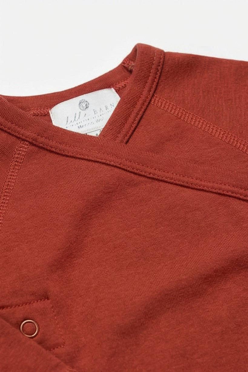 Détail de la maille de la Combinaison bébé en laine mérinos non traitée, vêtement naturel thermorégulant pour l’extérieur et l’intérieur Couleur : Henné